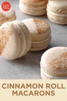 cinnamon roll macarons on a baking sheet