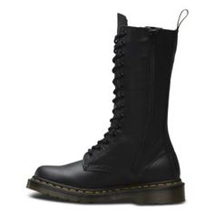 The Women's 1B99 14-eye lace up boot is a classic punk style, designed with soft, fine-grained leather treated to feel smooth and supple. Inside zip for easy access 14-eye boot Made with classic Doc's DNA, including grooved edges, visible stitching and heel-loop Built on the iconic Dr. Martens air-cushioned sole, which is oil and fat resistant with good abrasion and slip resistance Dr. Martens run true to US size with a little wiggle room for breathability or thicker socks. UK size on shoe. Classic Punk, Fred Perry Shirt, Visible Stitching, Boots Uk, Thick Socks, Punk Style, Martens Shoes, Extra Room, Mid Calf Boots