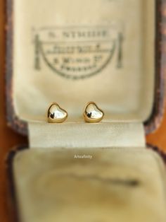 "Solid Heart Gold Studs, 9K Solid Gold Earrings, Real Gold Earrings, Spring and Summer Dainty Earrings, Elegant Earrings, Gift For Her -------DETAILS--------- - \"Single\" - refers to 1 individual earring     \"Pair\" - refers to 2 earrings - Measurement:0.5*0.5mm - length of earring post: 10mm - Material: 9K solid gold - Stamped with Au375(9K) hallmark  -  Free Beautifully wrapped & boxed -------PACKAGING------- We offer a free gift wrap option upon request. Just leave me a note at checkout saying that you would like your order gift wrapped. Each item is beautifully packaged in a letterbox friendly, hand stamped jewellery box made from 100% recycled card . -------MAINTENANCE------- Please store your accessories in a clean, dry environment. Avoid contact with cosmetics, perfumes, aerosols Heart-shaped Earrings For Mother's Day Formal, Classic Gold Heart Earrings For Formal Occasions, Elegant Earrings For Anniversary And Mother's Day, Classic Gold Heart Earrings For Anniversary, Classic Earrings For Valentine's Day, Classic Hallmarked Earrings For Valentine's Day, Elegant Gold Earrings For Anniversary Gift, Elegant Gold Earrings For Anniversary, Classic Yellow Gold Earrings For Valentine's Day