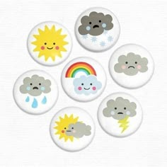 six buttons with different weather symbols on them, including clouds and rainbows in the sky