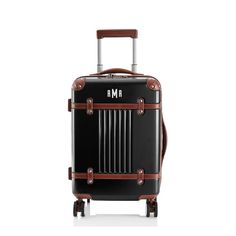 Our best selling luggage collection is designed to set you apart from the crowd with luxurious leather detailing and a personalized monogram. Made from durable polycarbonate that is incredibly lightweight, our signature spinners feature TSA approved personal locks, easy-telescoping handles, oversized wheels that can spin 360 degrees and optional expandable zippers so you can fit more into every trip. Designed to last, the Terminal 1 Collection comes with a lifetime limited warranty. If any part International Carry On Luggage, Black Suitcase, Luggage Black, Stylish Luggage, Travel Size Toiletries, Kids Lunch Bags, Checked Luggage, Personalized Luggage, Spinner Luggage