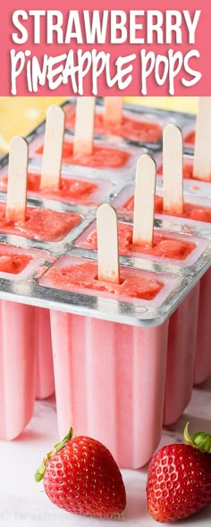 strawberry pineapple pops in ice cream cups with strawberries on the side and text overlay