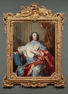 a portrait of a man in an ornate frame