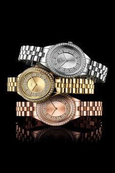 This luxe gold-tone bracelet watch is embellished with sparkling stones.- Style #: J6381A- Series: Bellini- Style: Bracelet- Gender: Women's- Case Material: Gold-tone stainless steel- Dial Color: Gold-tone- Hands: Gold-tone- Markers: Gold-tone indexes- Bracelet Material: Gold-tone stainless steel- Closure: Foldover clasp- Crystal: Mineral- Bezel: Embellished- Case Diameter: 30mm- Diamonds: 0.12ctw- Movement: Highest standard Japanese Multi-Function Movement- Water Resistance: 90ft/30M- Battery- Gold Diamond Watch With Accents, Gold Diamond Watch With Diamond Accents, Gold Diamond Watch With Rhinestones, Gold Cubic Zirconia Watches For Anniversary, Gold Round Watch With Rhinestones, Gold Round Watches With Rhinestones, Gold Watches With Rhinestones, Gold Watch With Diamond Accents And Round Dial, Gold Stainless Steel Diamond Watch With Diamond Hour Markers