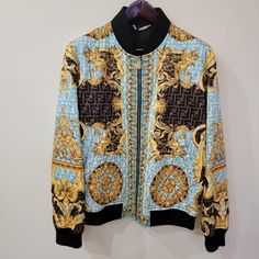 Absolutely Stunning Sold Out Fendace Quilted Barocco Zucca Monogram Print Jacket Nwt! This Jacket Has Been Sold Out For Some Time Now And Is Impossible To Get Your Hands On Now Especially New With Tags!! This Jacket Is A Size 52 Or Us Xl I Also Have Another In Size 50 Or Us Large! Keep Your Eye Out For Toms More Ridiculously Rare Versace Products And Designer I Have A Ton More Of This Fendace Versace Fendi Colab So Give Me A Follow So You Don’t Miss It!! This Is Some Of The Last Fendace You’ll F Luxury Monogram Print Outerwear For Winter, Luxury Monogram Printed Outerwear For Winter, Designer Long Sleeve Outerwear With Monogram Print, Luxury Long Sleeve Outerwear With Monogram Print, Luxury Monogram Print Fall Outerwear, Luxury Winter Outerwear With Monogram Print, Designer Monogram Print Long Sleeve Outerwear, Luxury Monogram Print Winter Outerwear, Versace Jacket Mens