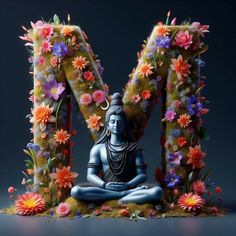 the letter m is made up of flowers and plants with a buddha statue in front