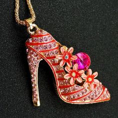 Betsey Johnson High Heel Shoe Crystal Pendant NecklaceItem: Necklace Brand: Betsey Johnson Necklace Chain Length: 27" Inches + 2" Extender Pendant Dimensions: 2.36" x 1.57" (Inches) Color: Pink & Gold Metal: Alloy, Lead & Nickle Free Theme: High Heel Shoe, Flowers Fun pendants, flirty necklaces, and chunky bracelets do more than just add a touch of sparkle – they represent who you are. Betsey Johnson Jewelry does this beautifully with a complete line of pieces that are anything but tradi Betsey Johnson Necklace, Crystal Shoes, Crystal Pendant Necklace, Chunky Bracelets, Necklace Chain Lengths, Necklace Brands, Betsey Johnson Jewelry, Crystal Necklace Pendant, Necklace Chain