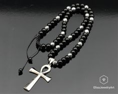 Big Ankh Cross Stainless Steel Pendant Necklace Natural Black Onyx & Hematite Beads Long Necklace Protection Healing Christmas Gift Men's -WHAT DOES THE ONYX STAND FOR A powerful protection stone, Black Onyx absorbs and transforms negative energy, and helps to prevent the drain of personal energy. Black Onyx aids the development of emotional and physical strength and stamina, especially when support is needed during times of stress, confusion or grief. -PRODUCT DETAILS Product Code : 1195 Big An Hematite Bead Necklaces As Gifts, Hematite Bead Necklace As A Gift, Adjustable Ankh Black Necklace, Beads Long Necklace, Ankh Cross, Physical Strength, Beaded Jewelry Necklaces, Personal Energy, Black Beaded Bracelets