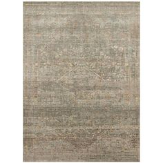 an area rug with various colors and patterns on the carpet, including grays, browns,