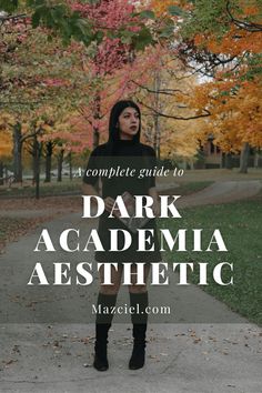 a woman in black hoodie standing on sidewalk with trees and leaves behind her text overlay reads a complete guide to dark academy aesthetic