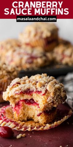 cranberry sauce muffins are stacked on top of each other and one is cut in half