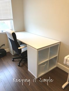 an empty room with a desk and chair