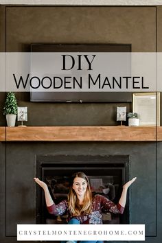 a woman sitting in front of a fireplace with her hands up and the words diy wooden mantel above her