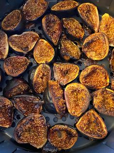 figs are cooking in a skillet on the stove top, ready to be cooked