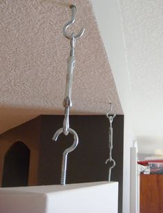 there is a metal hook on the ceiling