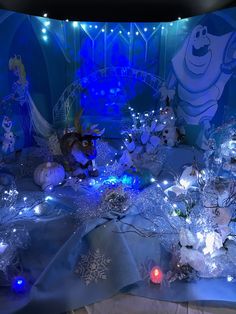 an elaborate display with snowflakes, lights and decorations