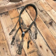 a rope that is on top of a wooden floor