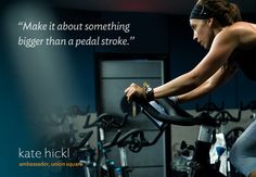 a woman on a stationary bike with a quote from kate nicki above her head