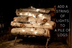 a pile of logs with some lights on them and the words add a string of lights to a pile of logs