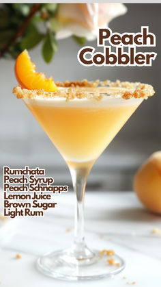 the peach cobbler cocktail is garnished with an orange slice