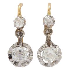 Petite Old Mine Diamonds in cushion shape dangle from their diamond tops. Every move makes the bottom stones articulate and shimmer. Made c. 1890, they were know as "dormeuse" or sleeper earrings for they are comfortable and of a size that one can sleep with when worn. At the century's turn, these were as popular with the well dressed woman as diamond stud earrings are today. The small diamonds at the top are 5 points each. The bottom stones are 39 points each making a total weight of 88 points. Antique Diamond Earrings, Turquoise Diamond Rings, Diamond Gold Earrings, Diamond Tops, Petite Earrings, Diamond Dangle Earrings, Victorian Rings, Natural Gold, Tiny Diamond