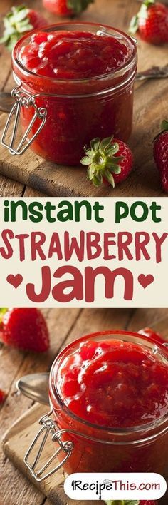 two jars filled with strawberry jam sitting on top of a wooden table next to strawberries