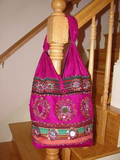 FABULOUS Purple Cotton Bohemian Shoulder Bag with Seed Bead and Mirror Decoration. You can use this beautiful should bag everyday or use it to go to the market. It has quite a bit of room inside and is very comfortable on the should as it is made from soft cotton fabric. The mirrors are accentually with the beautiful beadwork. PLEASE NOTE: One mirror is missing on the top row on the left on the front of the bag. It is barely noticeable and doesn't detract from it's beauty. Please feel free to co Beaded Bags For Everyday Use And Festivals, Everyday Beaded Bags For Festivals, Bohemian Embellished Shoulder Bag For Festival, Traditional Pink Beaded Bags, Bohemian Embellished Tote Shoulder Bag, Bohemian Embellished Travel Bags, Bohemian Embellished Bag For Festivals, Embellished Shoulder Bag For Festival, Embellished Rectangular Bag For Festival