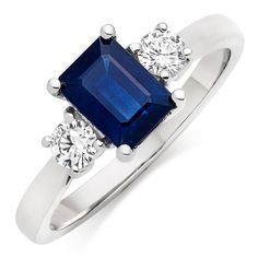 a blue sapphire and diamond three stone ring