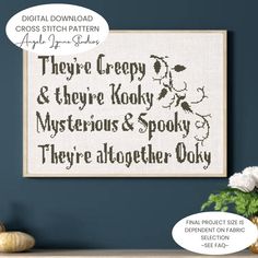 a cross stitch pattern with the words they're creepy and they're kooky mysterious & spooky