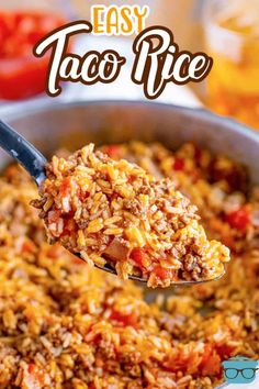 a spoon full of taco rice is being lifted from a pot with the words easy taco rice on it