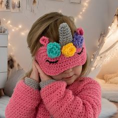 THIS LISTING IS FOR AN INSTANT DOWNLOAD CROCHET PATTERN - YOU WILL NOT RECEIVE A PHYSICAL ITEM This crochet pattern is for a kids unicorn sleep mask.  The eye mask has pretty flowers, unicorn ears, unicorn cone and sleepy eyes. The kids sleep mask is doubled up for a good quality sturdy mask.  One size fits all, adults and children!  ⭐️ Yarn  Aran (weight 4) yarn. I used Stylecraft special aran in the following colours and approximate amounts- A - Fondant 10g (22m/24yd) B - Silver 10g (22m/24yd) C - Lavender 2g (5m/6yd) D - Aspen 2g (5m/6yd) E - Saffron 2g (5m/6yd) F - Black 1g (2m/3yds) Total - 27g (61m/69yd) ⭐️ Supplies you will need - Crochet hook 5mm (H-8)  - Sharp sewing needle  - 32cm of elastic  - Aran/worsted weight 4 yarn - Scissors This pattern is easy skill level.  The pattern i Sleep Mask Crochet, Kids Sleep Mask, Mask Crochet, Onesie Pattern, Unicorn Ears, Unicorn Mask, Crochet Mask, Crochet Eyes, Mask Pattern