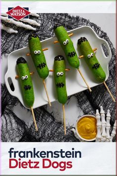 there are some pickles that have been made to look like characters on them and the words, frankennstein dietz dogs