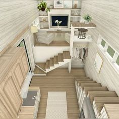 this is an aerial view of a tiny house with stairs and living room in it