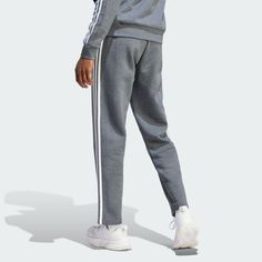 adidas Essentials 3-Stripes Open Hem Fleece Pants - Grey | Men's Lifestyle | adidas US Adidas Sporty Sweatpants With Three Stripes, Sportswear Sweatpants With Three Stripes Branding, Adidas Three Stripes Activewear For Jogging, Adidas Activewear For Jogging With Three Stripes, Adidas Sportswear Sweatpants With Three Stripes, Sportswear Bottoms With Three Stripes Branding For Jogging, Sporty Lounge Pants With Three Stripes, Sporty Loungewear Pants With Three Stripes, Adidas Athleisure Sweatpants With Three Stripes