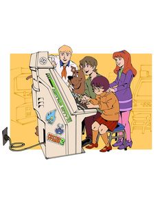 a group of people standing around a computer