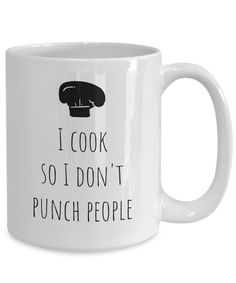 a white coffee mug with the words i cook so i don't punch people