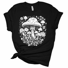 "Quality: Our Women's Mushroom graphic t-shirts are professionally designed and printed with aesthetic love in the USA. We use the highest quality inks on Premium Bella + Canvas shirts for a look you can be proud of. You'll love the soft feel, comfort, and unique look of this #1 best-selling Mushroom t-shirt. Imagine the compliments you'll receive. Perfect if your looking for a Mushroom shirt, cottagecore clothing, y2k clothing, fairycore clothing, goblincore clothes or aesthetic mushroom clothes. Fit: Fits true to size for comfort that will make you feel amazing. Our Women's t-shirts are pre-shrunk, tailored cut with fitted sleeves and side seams to keep you looking classy, sassy, or a bit smart as.. you move about your day. We do not pre-tie or roll our shirts. We leave that up to your s Mushroom Clothes, Mushroom Collage, Goblincore Clothes, Fairycore Clothing, Aesthetic Mushroom, Mushroom Graphic, Mushroom T Shirt, Clothing Y2k, Mushroom Shirt