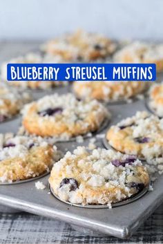 blueberry crumb muffins in a muffin tin