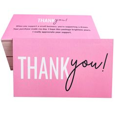 a pink thank card with the words thank you written on it