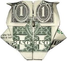 an origami owl made out of one dollar bill