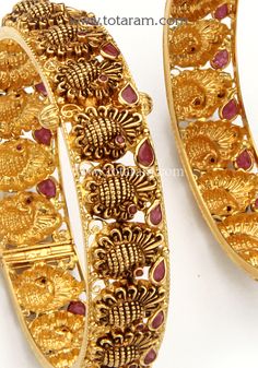 22 Karat Gold "Peacock" Kada With Color Stones - Set of 2 (1 Pair) - Temple Jewellery - 235-GK668 - in 48.500 Grams for USD $3809.49. 
Made in India by Totaram Jewelers Online this product is in Gold - 22 Karat BIS Hallmark 916 KDM Gold  & is an excellent gift for Adult - Women. Ships fully insured with secured guaranteed delivery for free with your order over $250 from New Jersey USA & comes with 30 days exchange policy. Gold Sets With Peacock Design For Festive Season, Elegant Gold Set With Peacock Design, Elegant Gold Sets With Peacock Design, Festive Gold Sets With Peacock Design, Traditional Gold Sets With Peacock Design, Diwali Gold Sets With Peacock Design, Ceremonial Gold Sets With Motifs, Traditional Sets With Intricate Design For Puja, Gold Peacock