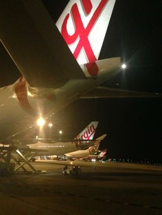 the tail end of an airplane at night