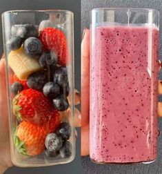 a person holding up a glass with fruit in it next to a plastic container filled with berries and blueberries