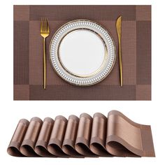 there is a plate, fork and knife next to napkins on the place mat