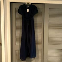 Nwt Navy Blue Flutter Sleeve With A V-Neckline And Empire Waist. Lined Dress. Perfect For A Summer Night Party Size Large- Would Fit An 8-10. Top Rated Seller Fast Shipping Smoke Free Home V-neck Chiffon Maxi Dress With Tie Waist, Blue Flowy Wrap Dress, Blue Dress With Tie Waist And Surplice Neckline, Blue Wrap Evening Dress, Flowy Blue V-neck Maxi Dress, Summer Night Party, Sleeve Maxi Dress, Night Party, Summer Night