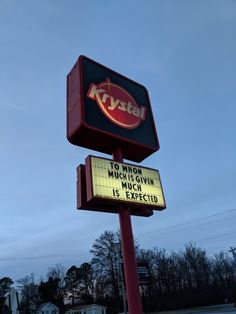 a sign for a restaurant that says krystel to help munchs give much more than its expecita