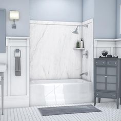 a bathroom with a sink, toilet and bathtub in white and gray colors on the walls