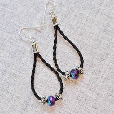 Versatile horse hair earrings to dress up your jeans and add just the right horsey touch when you go out!Sparkling purple glass Czech beads are the perfect compliment any horse's coloring. The Details::  Approximate length is 2.5 inches from curve of ear wires to bottom of gemstone - unless otherwise specified in the " Fur Jewelry, Beaded Horse, Mane Hair, Horse Hair Bracelet, Hair Earrings, Horse Hair Jewelry, Hair Necklace, Custom Horse, Horse Coloring