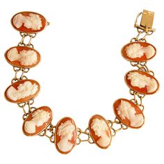 A vintage 14 karat (krt) yellow gold and hand carved shell cameo link bracelet. The bracelet features nine cameos in oval 14 krt setting. Each cameo features an unique female silhouette in the Victorian style. The bracelet closure is stamped with K14 that stands for the 14 karat gold content. The item was manufactured in the middle of the 20th century and it is in good vintage condition. The Cameo jewels are one of the most classic example of jewelry that is indispensable in each woman's collection. European Modern, Female Silhouette, Carved Shell, Woman Silhouette, Gold Hands, Victorian Style, Victorian Fashion, Link Bracelets, 20th Century