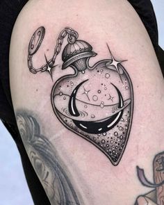 a black and white image of a heart with a clock on it's side